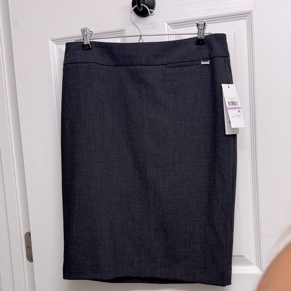 DKNY 
Pencil skirt
Size: 6
Color: Charcoal Grey
NWT